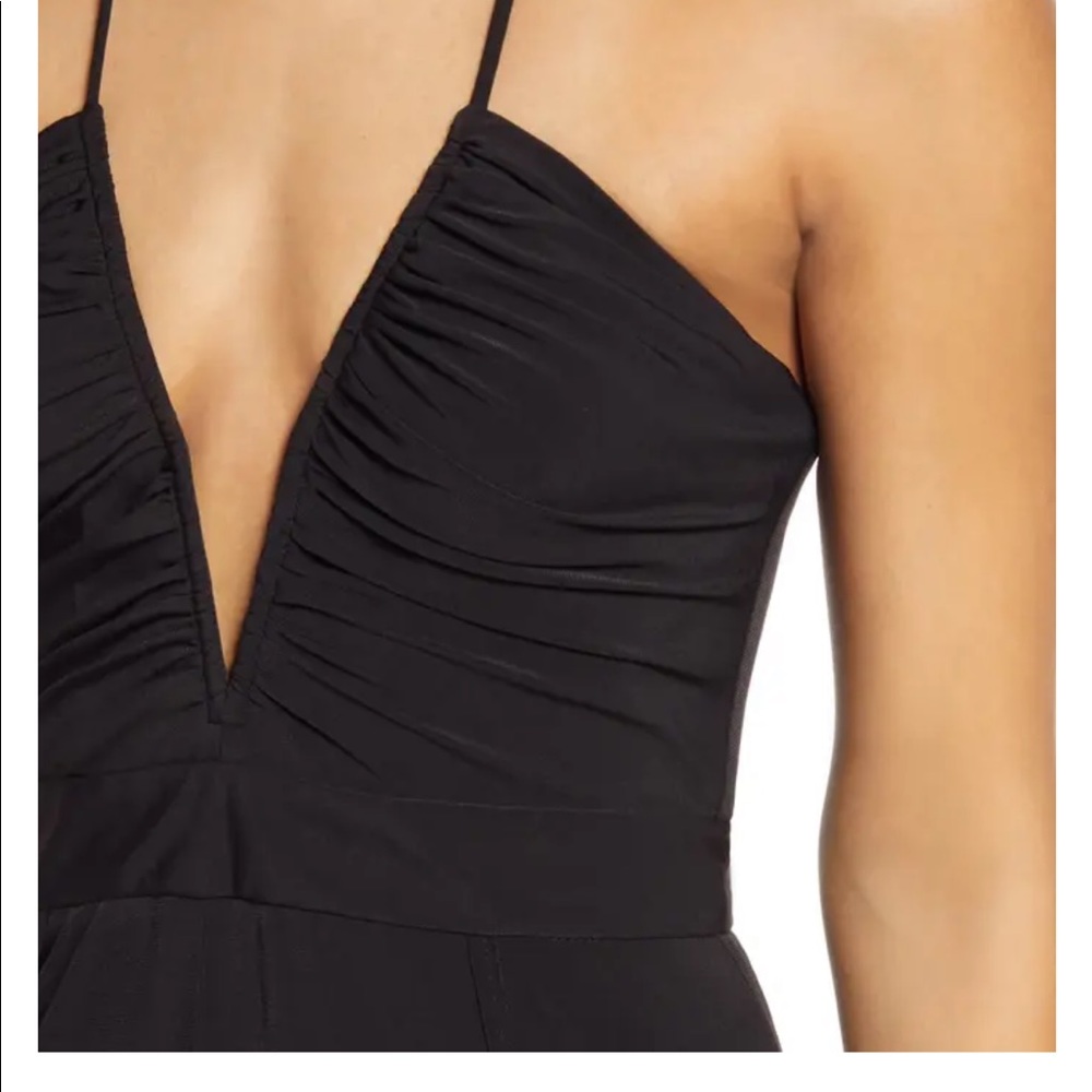 Black jumpsuit. NEVER WORN